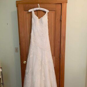 Classic ivory lace wedding gown